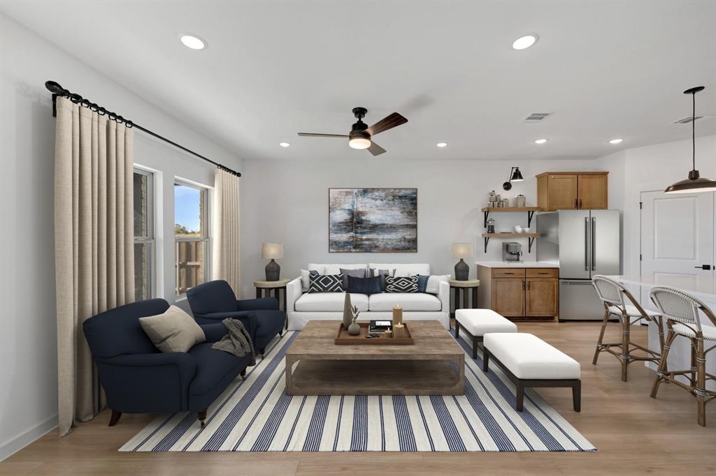 1424 Elliott Road Howe, TX 75459 - Photo 3 of 28 a living room with furniture fireplace and a large window