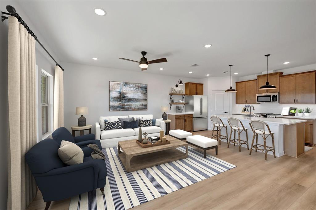 1424 Elliott Road Howe, TX 75459 - Photo 4 of 28 a living room with fireplace furniture and a wooden floor