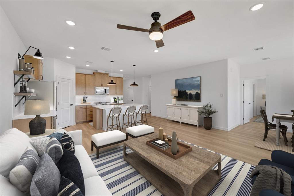 1424 Elliott Road Howe, TX 75459 - Photo 6 of 28 a living room with furniture and a flat screen tv