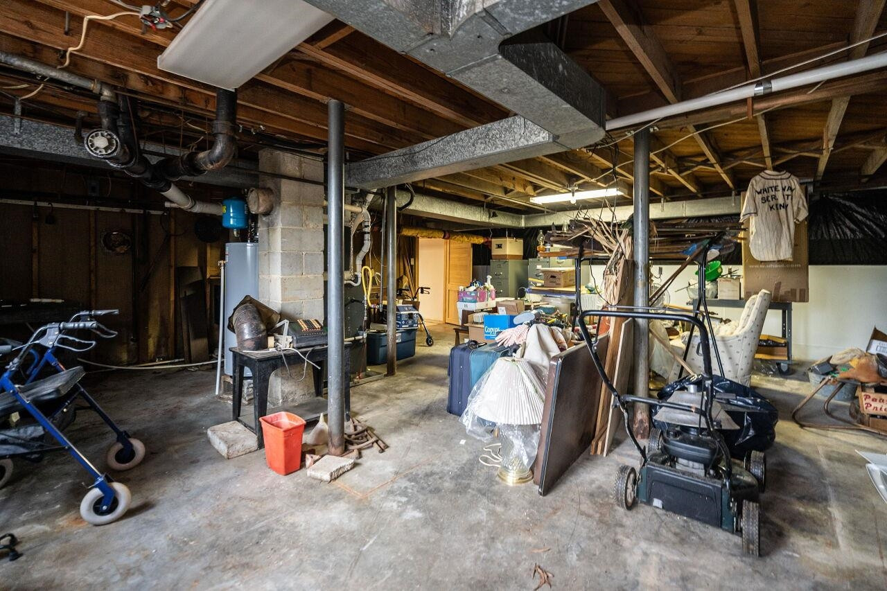 211 Quail Drive Raleigh, NC 27604 - Photo 26 of 28 Unfinished Side of Basement