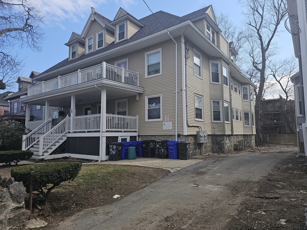 161 Townsend Street, Unit 1 Boston, MA 02121 - Photo 2 of 2 a view of house with a yard