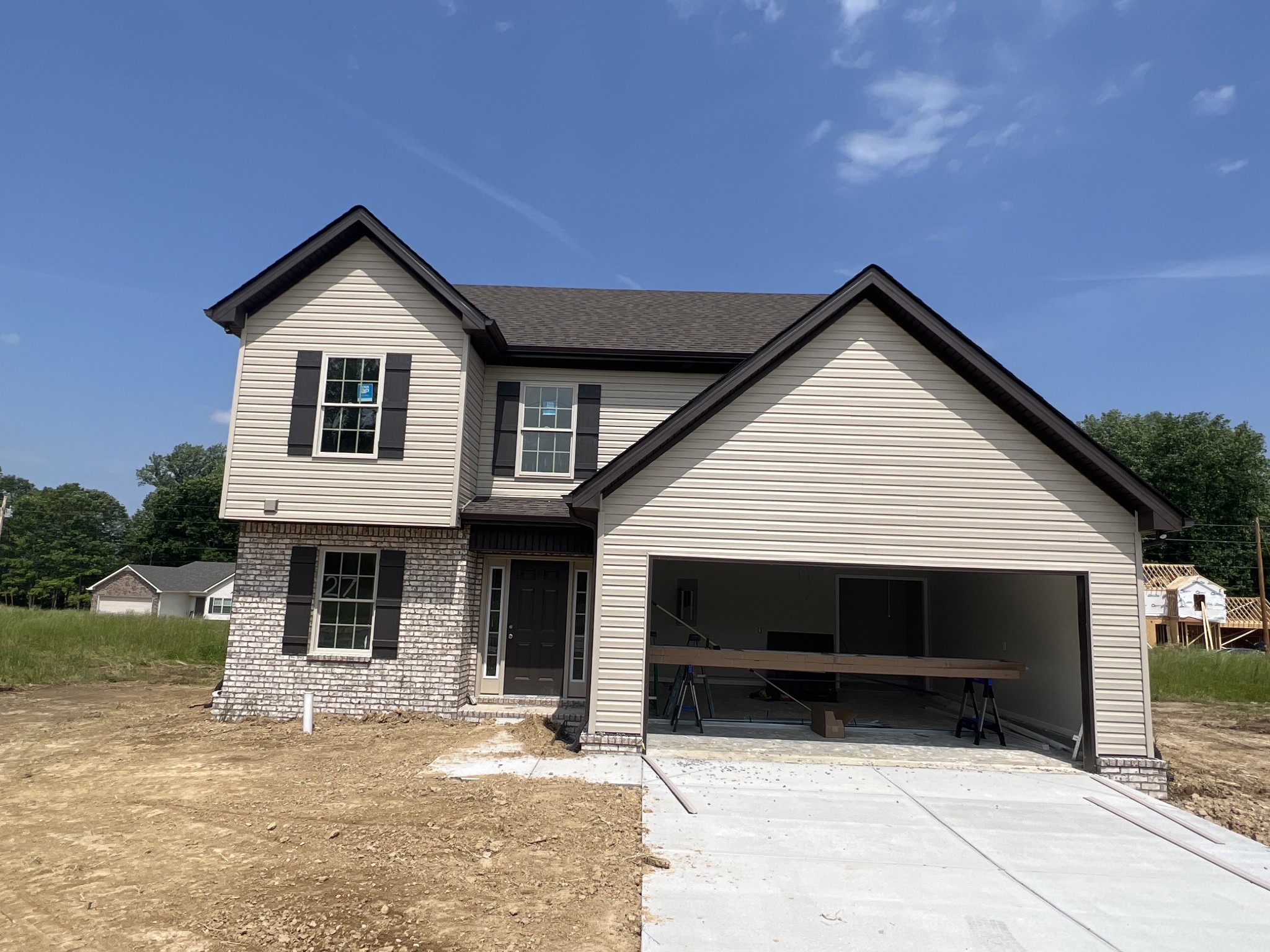 106 Timber Circle Manchester, TN 37355 - Photo 4 of 13 a front view of a house with garage