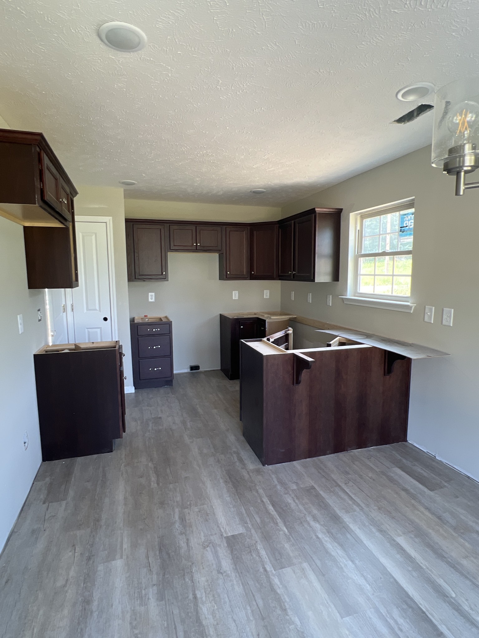 106 Timber Circle Manchester, TN 37355 - Photo 5 of 13 a view of kitchen with stainless steel appliances granite countertop a sink a stove top oven a counter space and cabinets