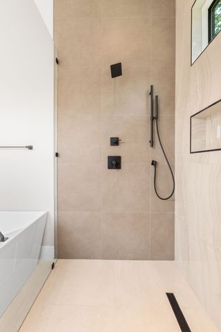 a view of an empty room with a fan