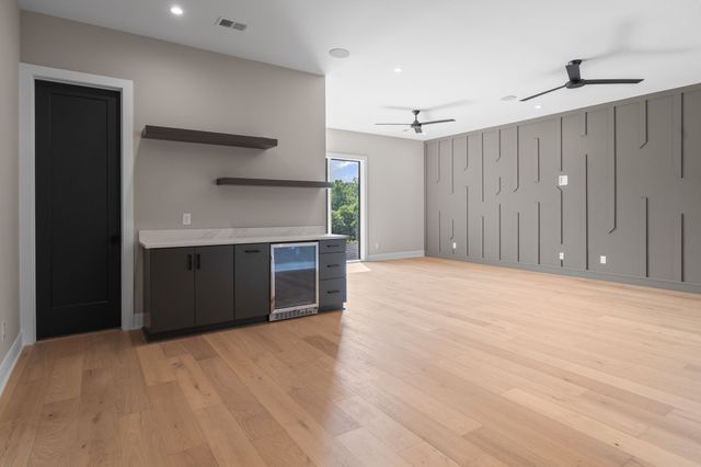 front view of a house with a big yard