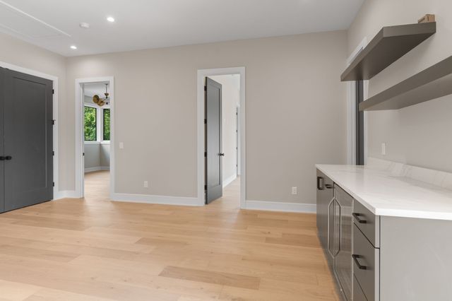 a view of a house with a back yard