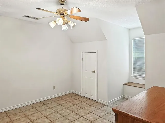 a view of an empty room with window