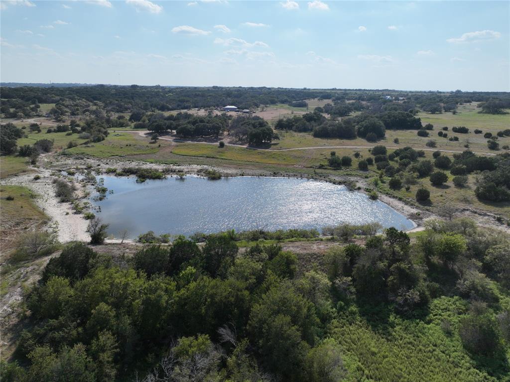 895 Pr 202 / Highway Hamilton, TX 76531 - Photo 2 of 40 a view of a lake with mountains in the background