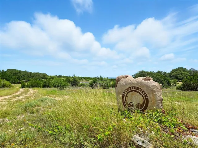 a view of lake with mountain in the back