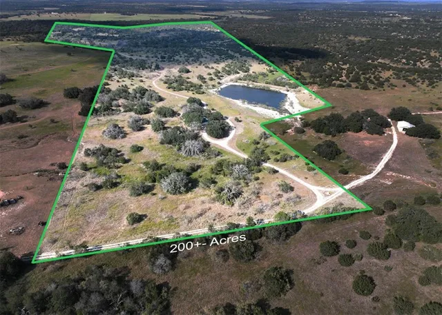 a view of a backyard of a house