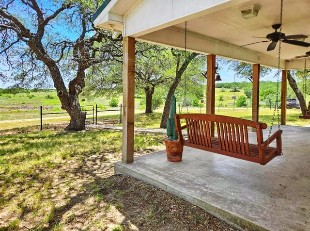a view of porch with a backyard