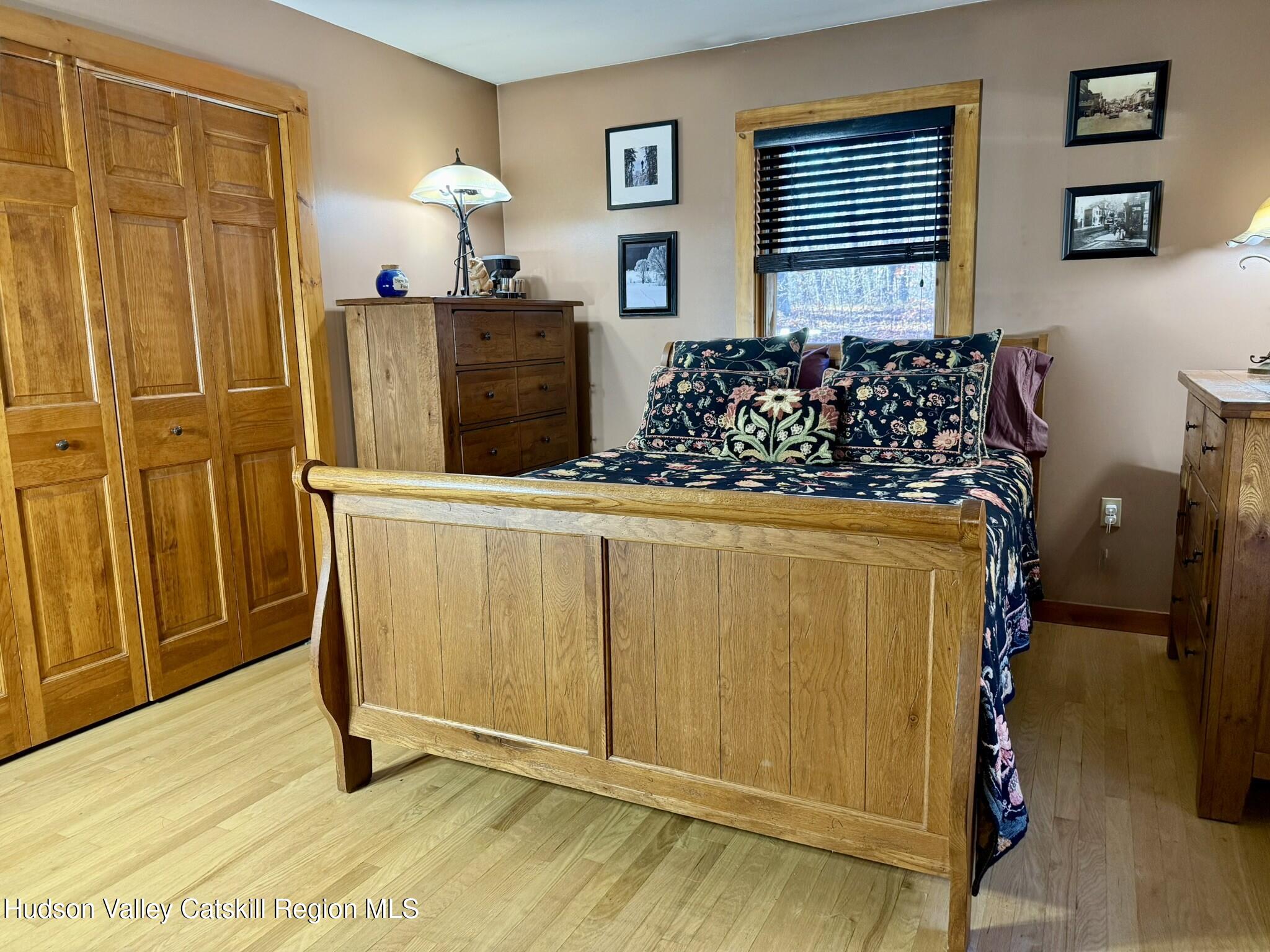 485 Potic Mountain Road Catskill, NY 12414 - Photo 7 of 46 a bed room with a bed and a dresser