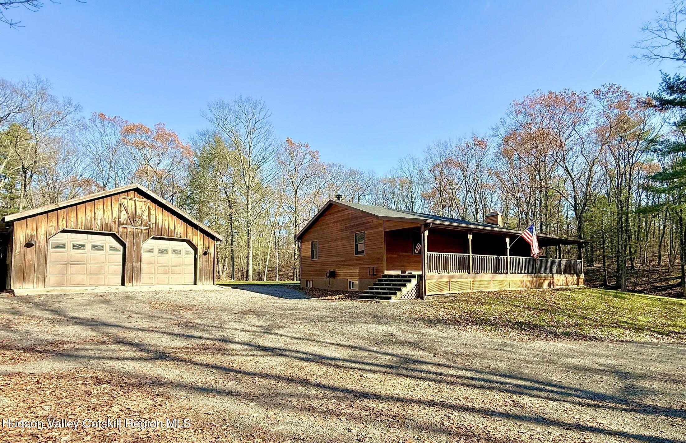 485 Potic Mountain Road Catskill, NY 12414 - Photo 2 of 46 a view of a house with a yard