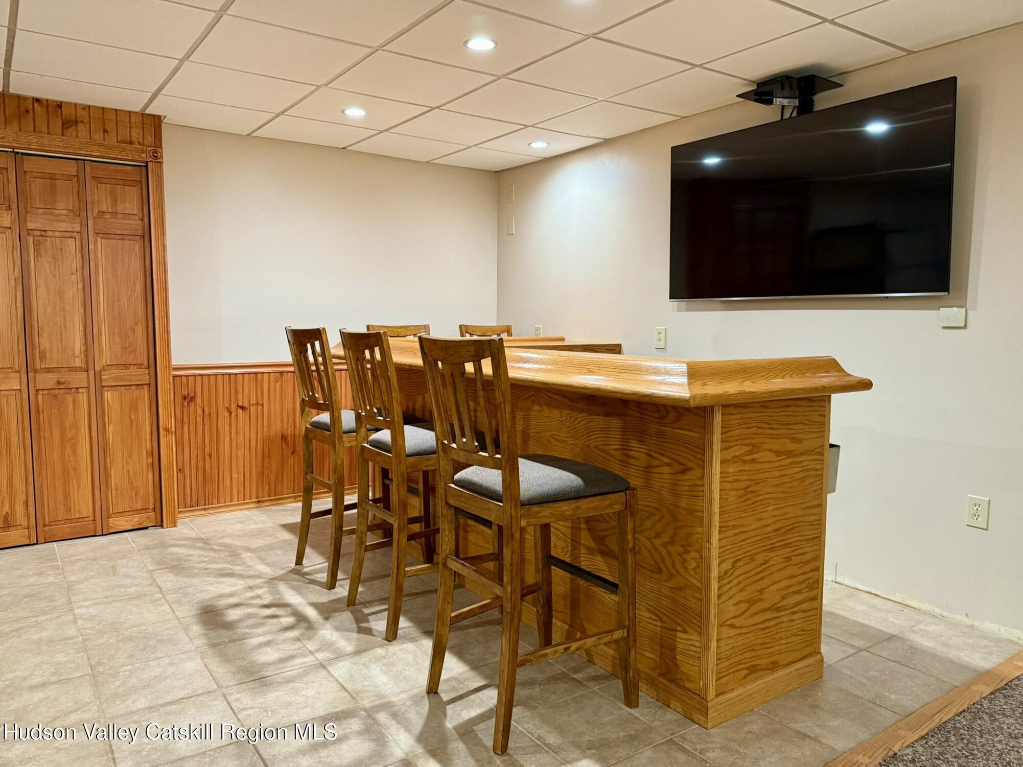 485 Potic Mountain Road Catskill, NY 12414 - Photo 24 of 46 a view of a livingroom with furniture and a flat screen tv
