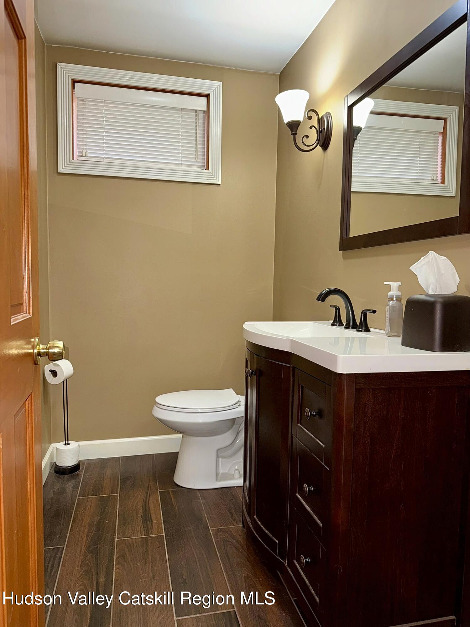485 Potic Mountain Road Catskill, NY 12414 - Photo 25 of 46 a bathroom with a sink and a toilet