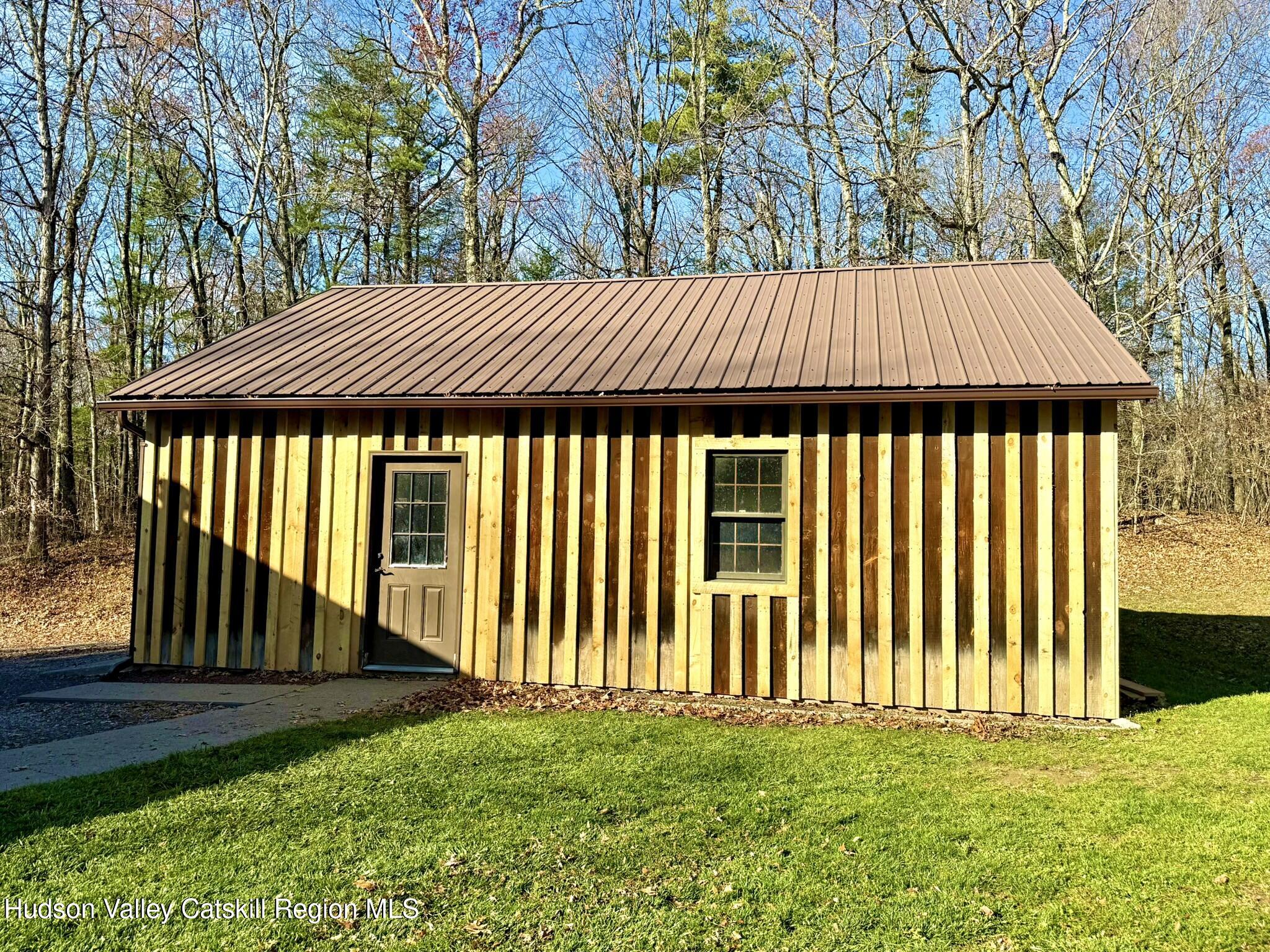 485 Potic Mountain Road Catskill, NY 12414 - Photo 35 of 46 a view of a house with a yard