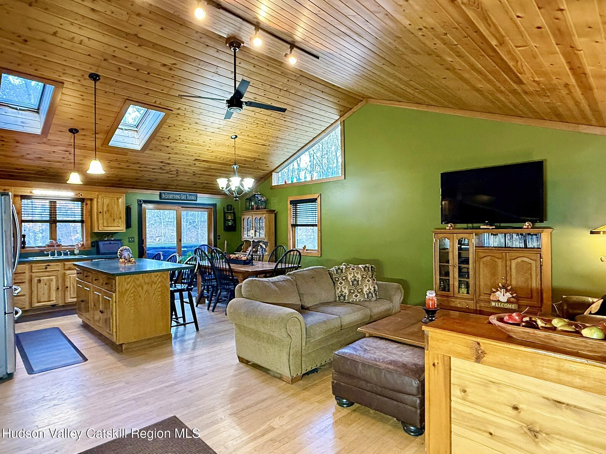 485 Potic Mountain Road Catskill, NY 12414 - Photo 41 of 46 a living room with furniture and a flat screen tv