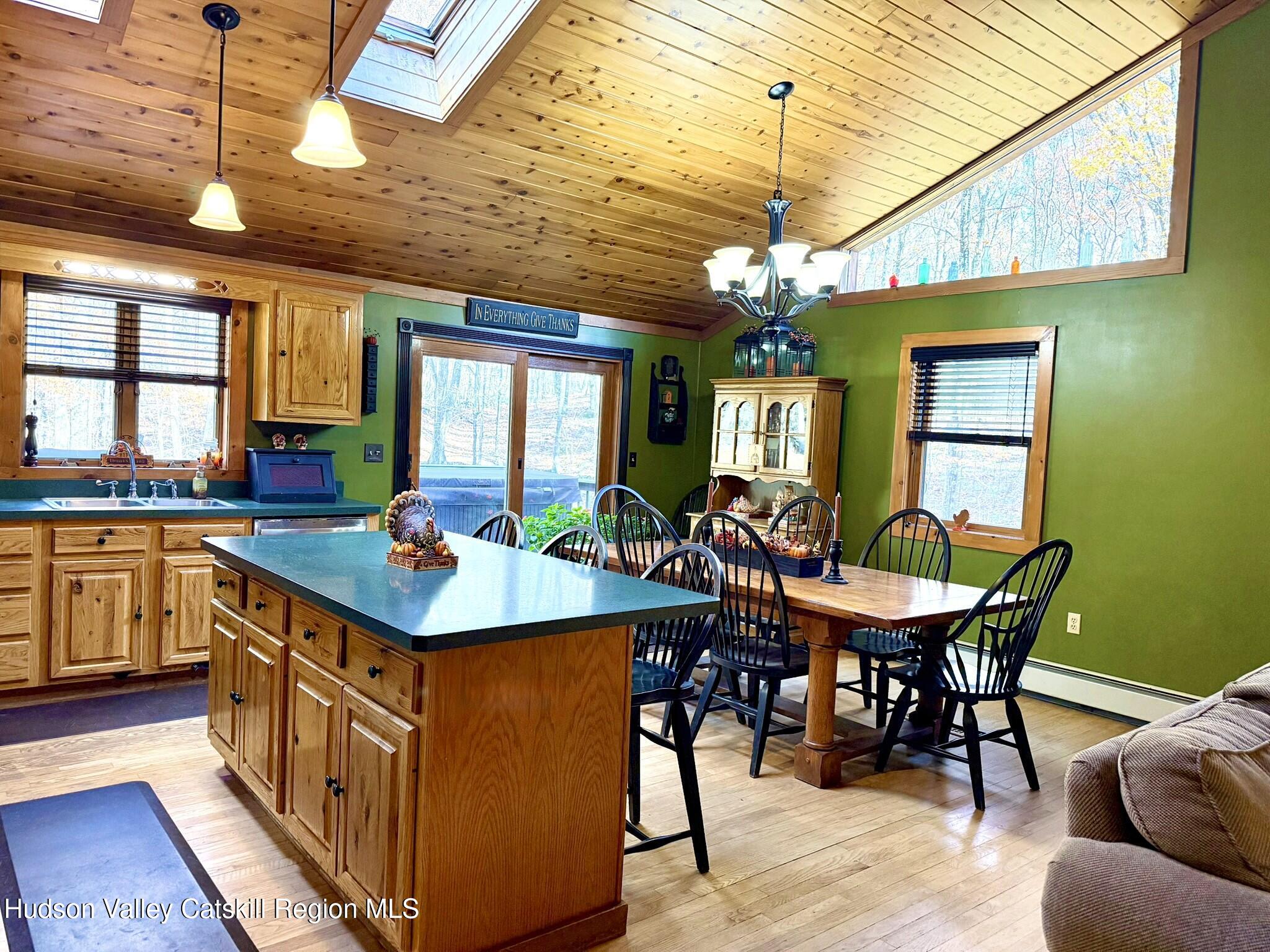485 Potic Mountain Road Catskill, NY 12414 - Photo 42 of 46 a kitchen with stainless steel appliances granite countertop a kitchen island a stove and a sink