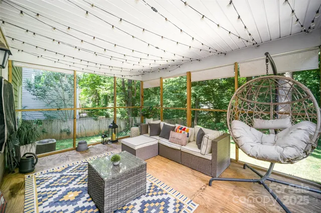 a outdoor living space with furniture and garden view