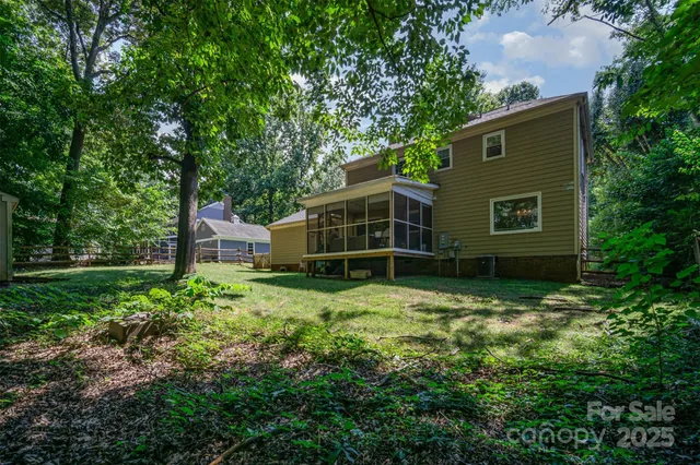 a house with trees in front of it