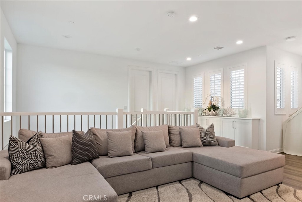 20732 Beech Circle Porter Ranch, CA 91326 - Photo 21 of 72 a living room with furniture and a large window