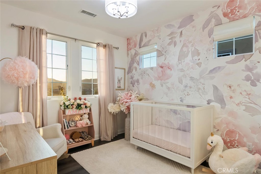 20732 Beech Circle Porter Ranch, CA 91326 - Photo 22 of 72 a spacious bedroom with a bed and a window