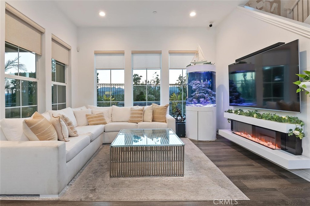 20732 Beech Circle Porter Ranch, CA 91326 - Photo 3 of 72 a living room with furniture and a large window