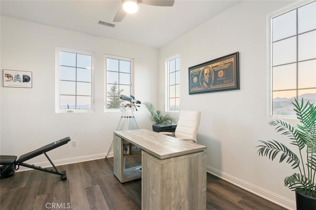 20732 Beech Circle Porter Ranch, CA 91326 - Photo 34 of 72 a view of a workspace with furniture and a potted plant
