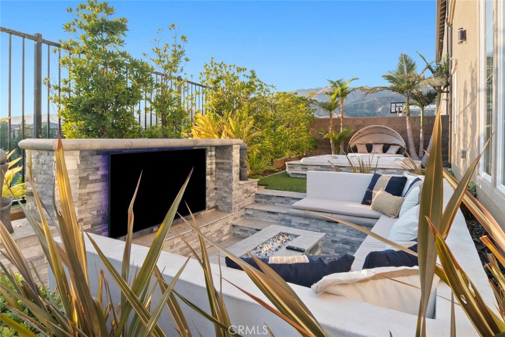 20732 Beech Circle Porter Ranch, CA 91326 - Photo 40 of 72 a view of backyard with outdoor seating and plants