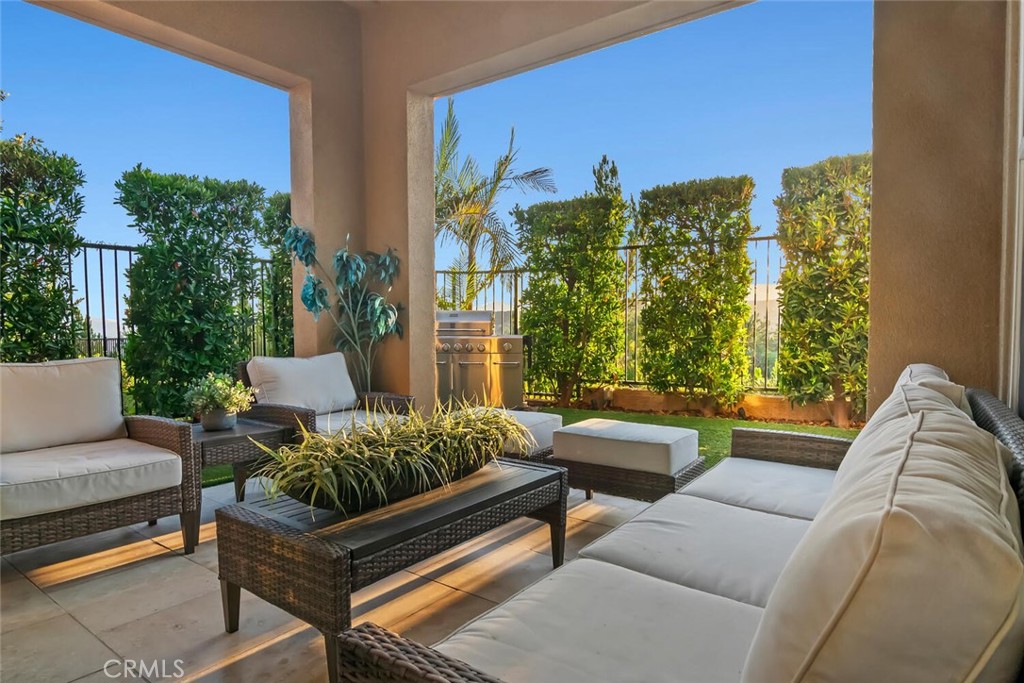 20732 Beech Circle Porter Ranch, CA 91326 - Photo 71 of 72 a living room with furniture and a large window