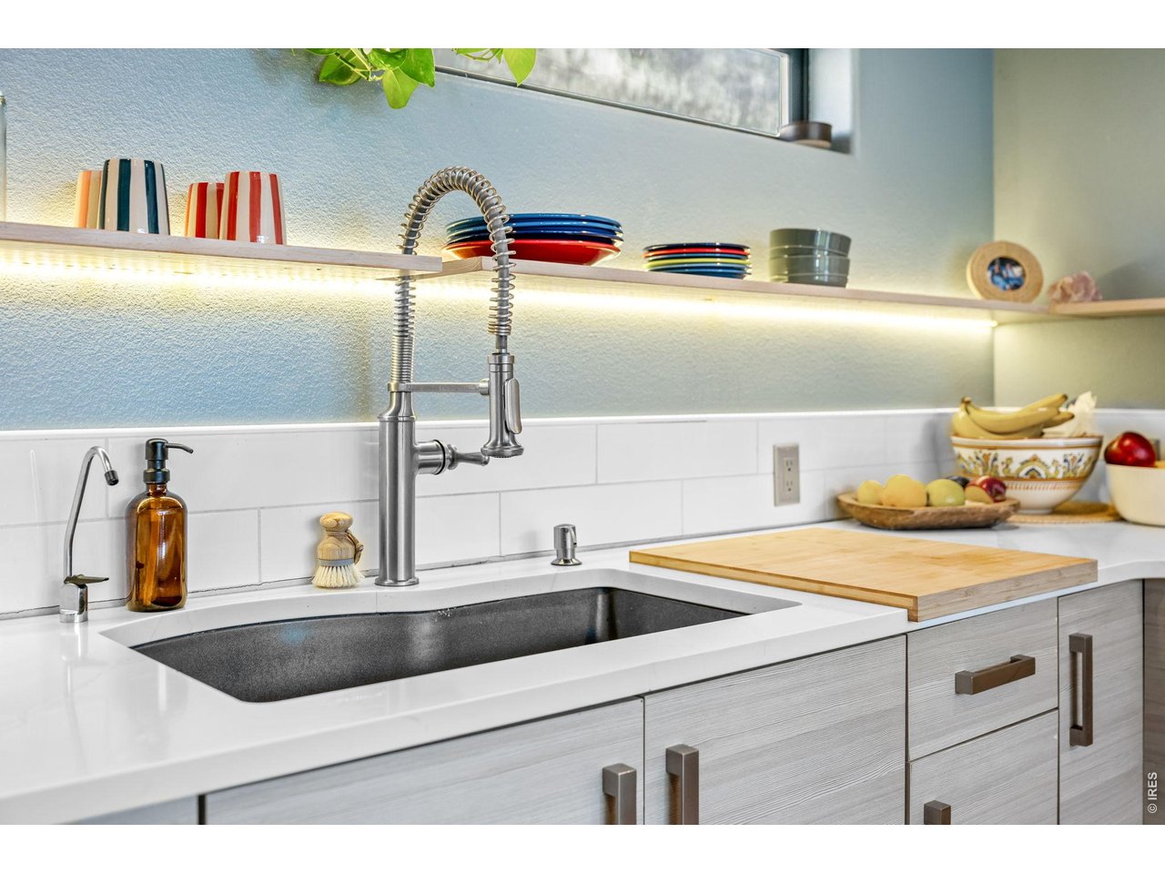 865 North Cedar Brook Road Boulder, CO 80304 - Photo 15 of 49 a kitchen with a sink and a stove