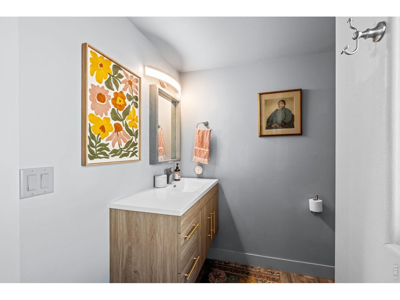 865 North Cedar Brook Road Boulder, CO 80304 - Photo 27 of 49 a bathroom with a sink mirror and vanity