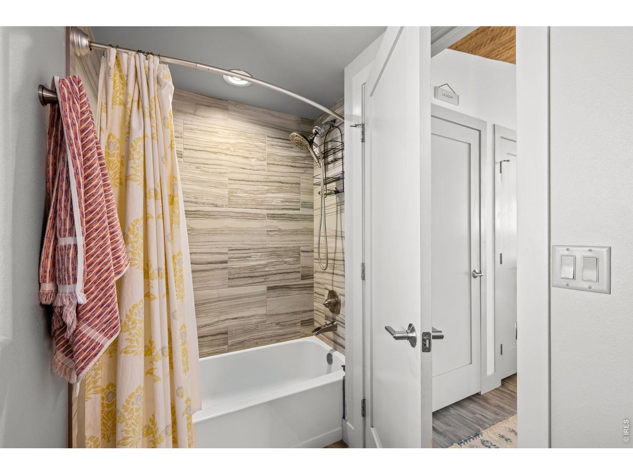 865 North Cedar Brook Road Boulder, CO 80304 - Photo 28 of 49 a bathroom with a bathtub and a shower