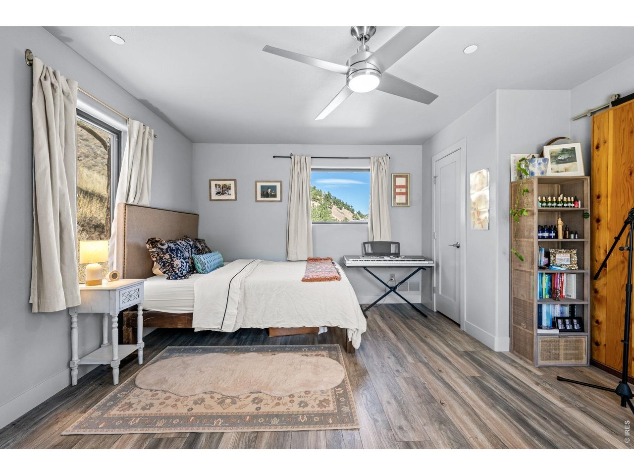 865 North Cedar Brook Road Boulder, CO 80304 - Photo 32 of 49 a living room with furniture and a window