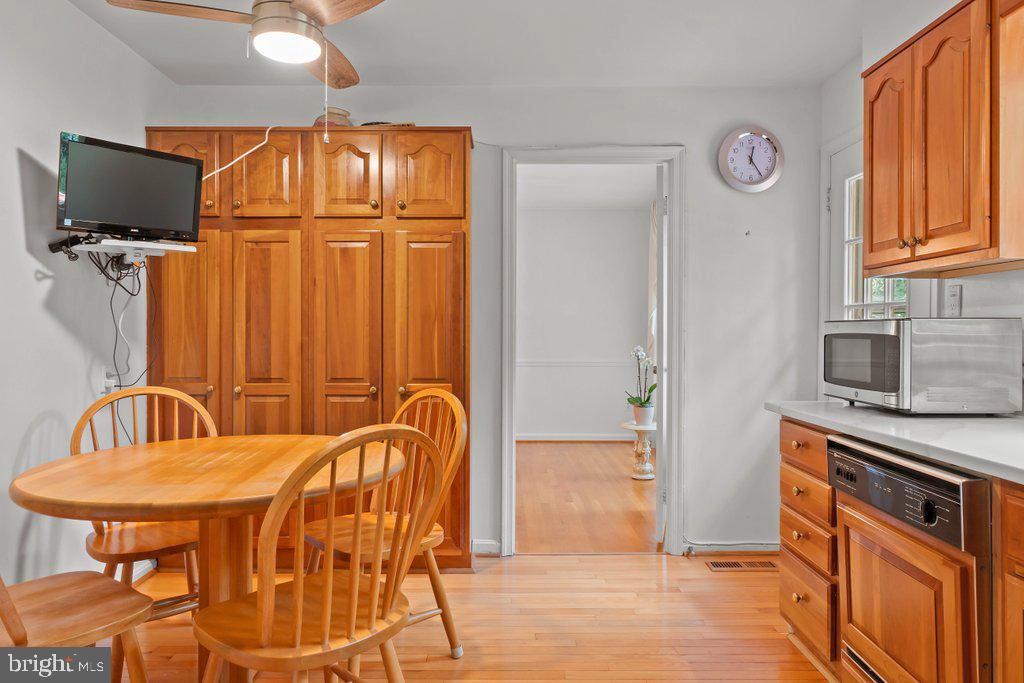 9704 Hall Road Potomac, MD 20854 - Photo 17 of 41 a dining room with furniture and window