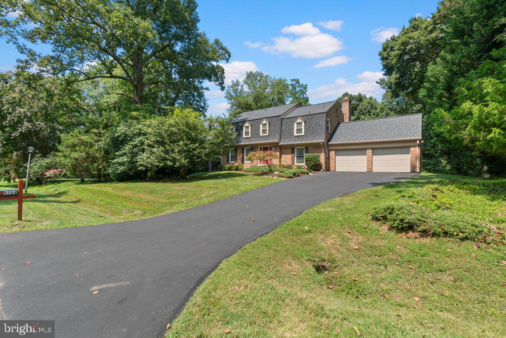 9704 Hall Road Potomac, MD 20854 - Photo 2 of 41 a view of a house with a street
