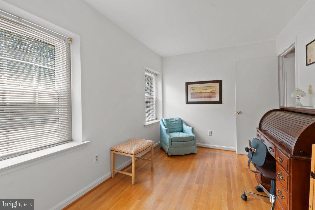9704 Hall Road Potomac, MD 20854 - Photo 26 of 41 a living room with furniture and a wooden floor