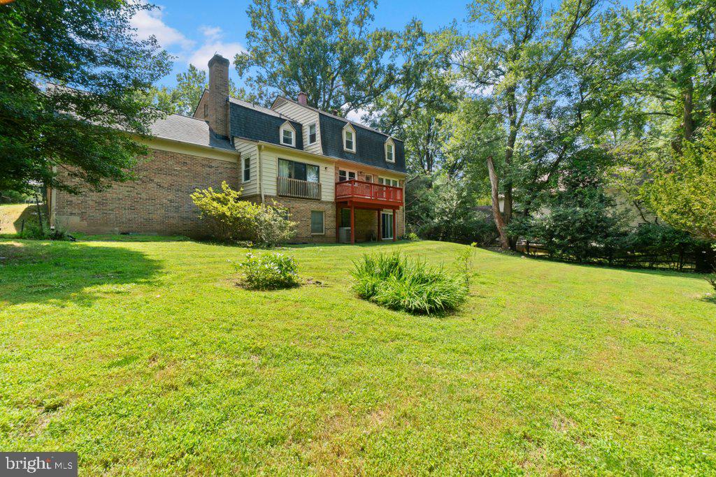 9704 Hall Road Potomac, MD 20854 - Photo 39 of 41 a view of a house with a yard
