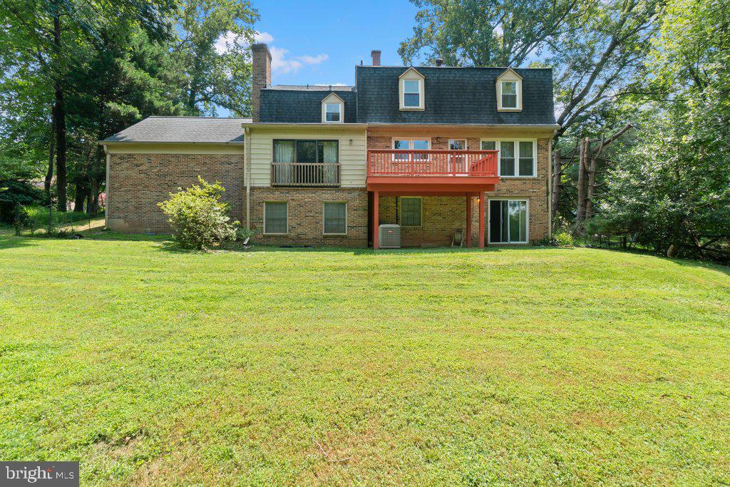 9704 Hall Road Potomac, MD 20854 - Photo 41 of 41 a view of a house with yard and garage