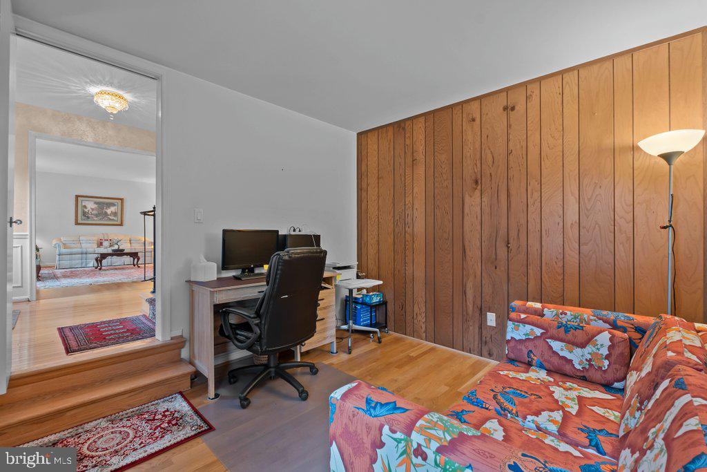 9704 Hall Road Potomac, MD 20854 - Photo 6 of 41 a bedroom with a bed and furniture