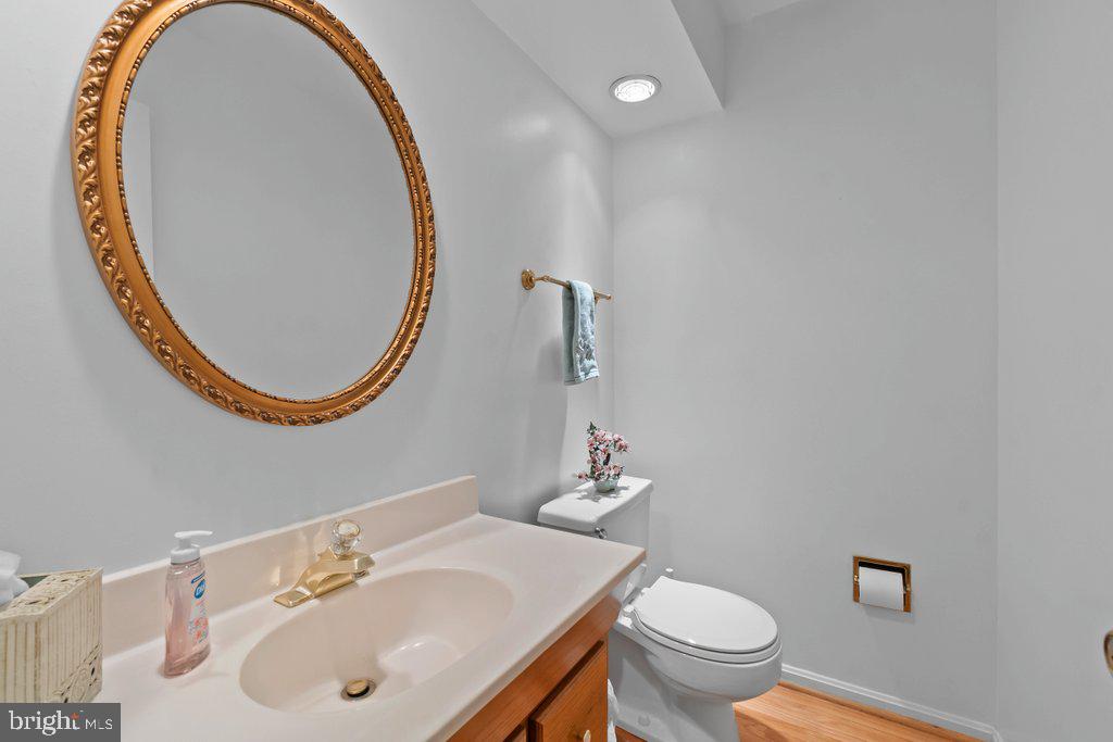 9704 Hall Road Potomac, MD 20854 - Photo 7 of 41 a bathroom with a sink and a mirror