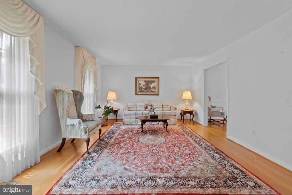 9704 Hall Road Potomac, MD 20854 - Photo 8 of 41 a living room with furniture rug and window