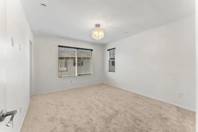 an empty room with a bathroom