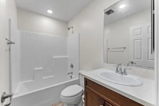 a front view of a house with garage