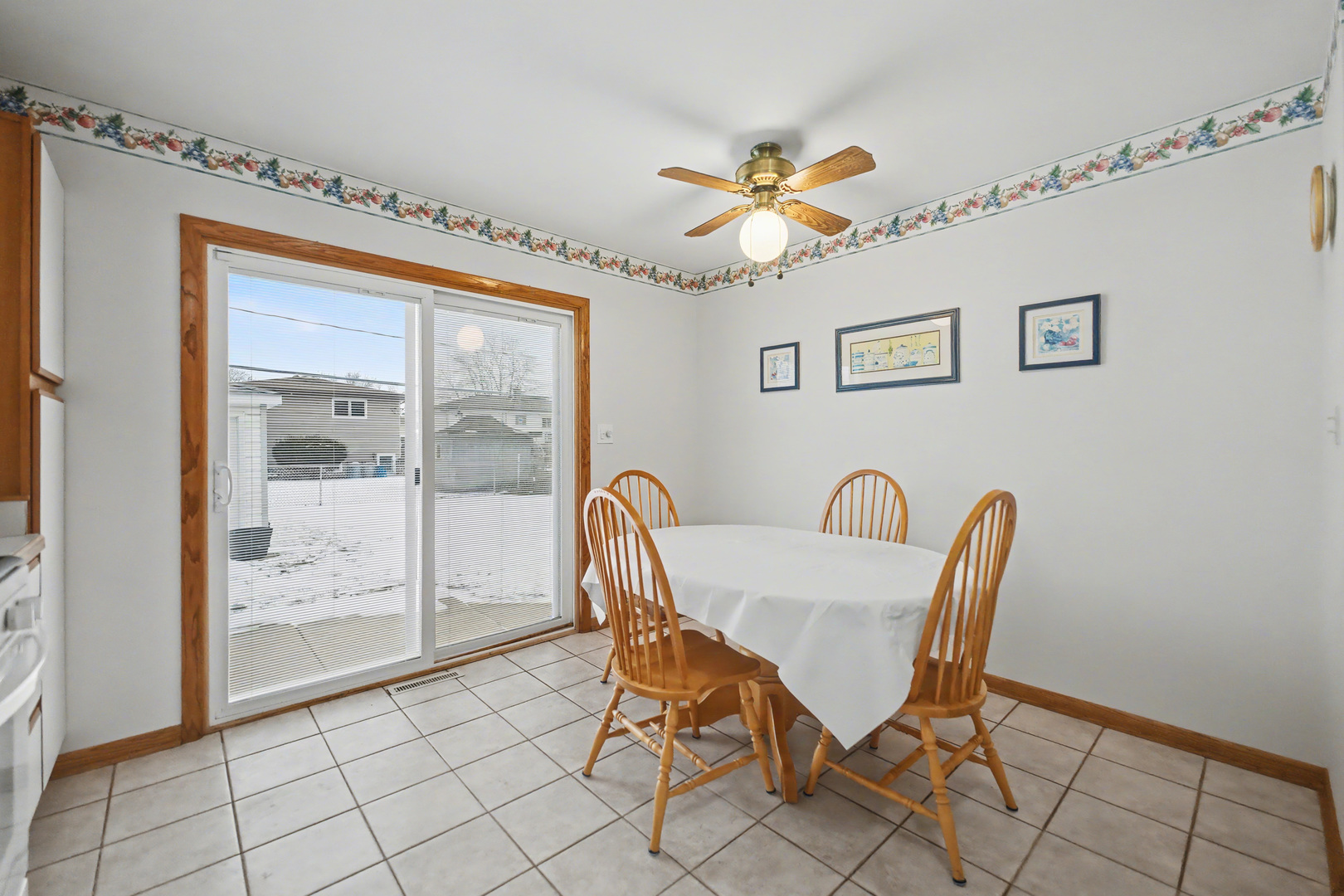 118 Evergreen Street Addison, IL 60101 - Photo 13 of 38 a view of a dining room that has a table and chair