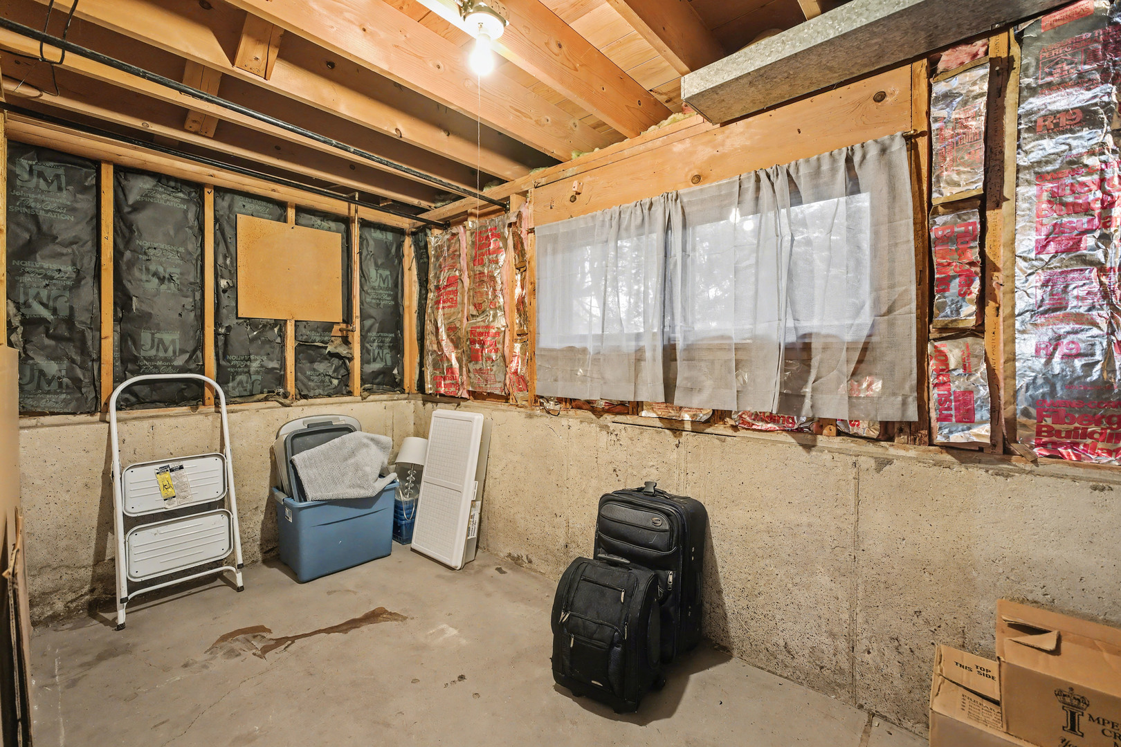 118 Evergreen Street Addison, IL 60101 - Photo 28 of 38 a view of living room with furniture and floor to ceiling window