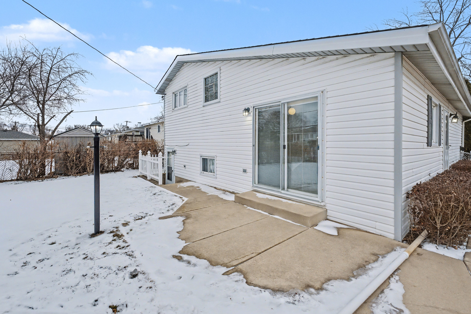 118 Evergreen Street Addison, IL 60101 - Photo 34 of 38 a view of a house with a snow