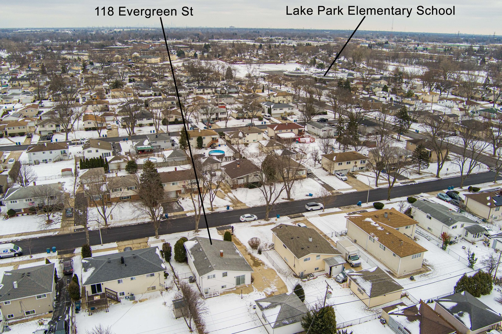 118 Evergreen Street Addison, IL 60101 - Photo 7 of 38 an aerial view of a city