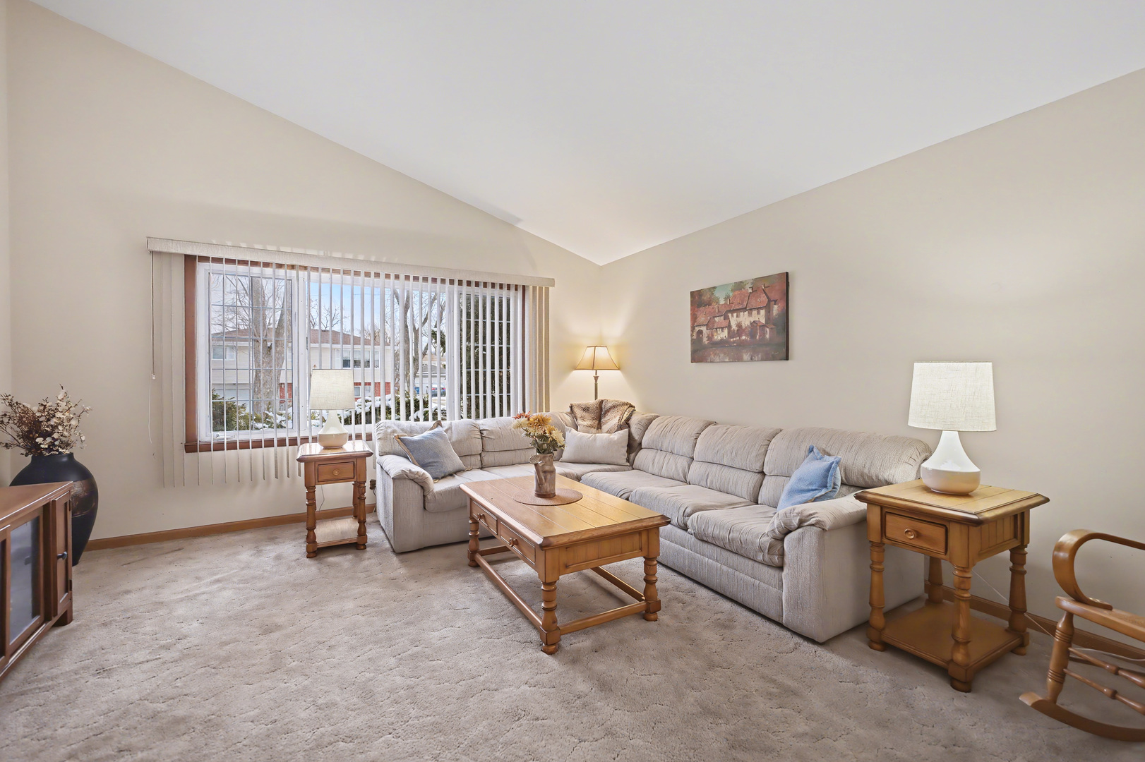 118 Evergreen Street Addison, IL 60101 - Photo 10 of 38 a living room with furniture and a large window