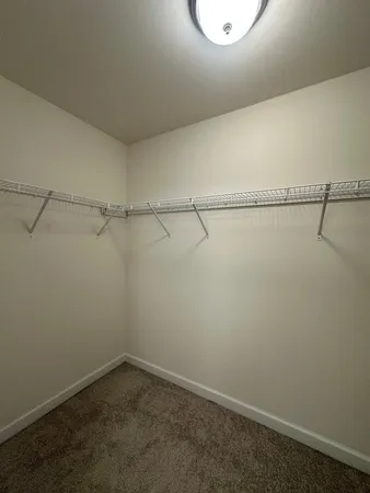 a view of a room with racks on the wall